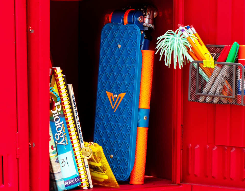 Image of folded Valor Scooter inside a red locker